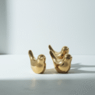 Sculptural gold bird decor set with reflective surface, gold bird decor set, available at Mint LB Zahle Lebanon