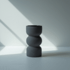 grey sculpted ceramic vase with rounded silhouette in matte finish from Mint LB