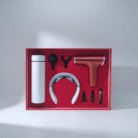 White and red massage gift box with massage gun and neck massager from Mint LB