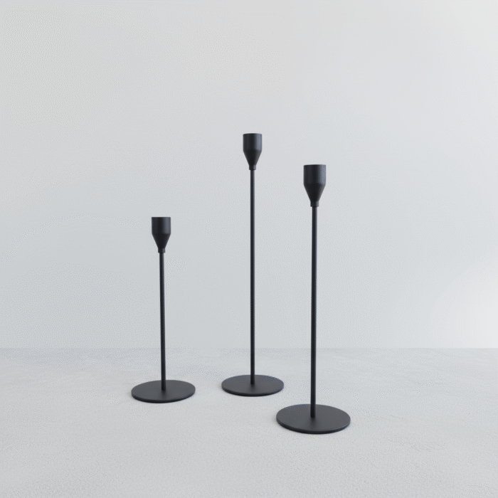 Minimalist black candle holder set with smooth matte finish and varying heights, black candle holder set available at Mint LB Zahle Lebanon