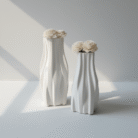 ceramic bohemian white vase with sculpted curved design in matte white from Mint LB