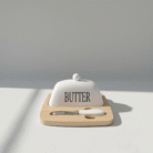 Cream dome butter dish with bold print, smooth natural base, white handle spreader, cream butter dish serveware, available at Mint LB Zahle Lebanon