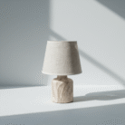Cozy modern linen table lamp with textured wood base on a white surface at Mint LB Zahle Lebanon