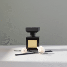 Sleek black home fragrance diffuser with gold label and sculptural design, black home fragrance, available at Mint LB Zahle Lebanon