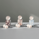 Decorative floral scented candle jar with clear top in plum, beige, and blue floral patterns; floral scented candle jar available at Mint LB Zahle Lebanon