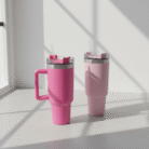Modern pink tall insulated tumbler with ergonomic handle, smooth finish, and secure lid, pink tall insulated tumbler, available at Mint LB Zahle Lebanon