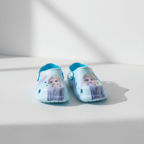 Light blue kids clogs with Elsa Frozen character art and perforated upper, light blue shade, available at Mint LB Zahle Lebanon