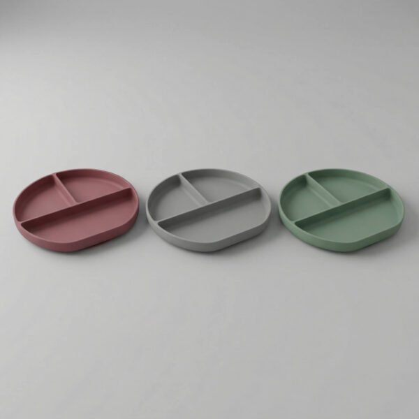 Sage green silicone baby plate with three divided sections and smooth finish, available at Mint LB Zahle Lebanon