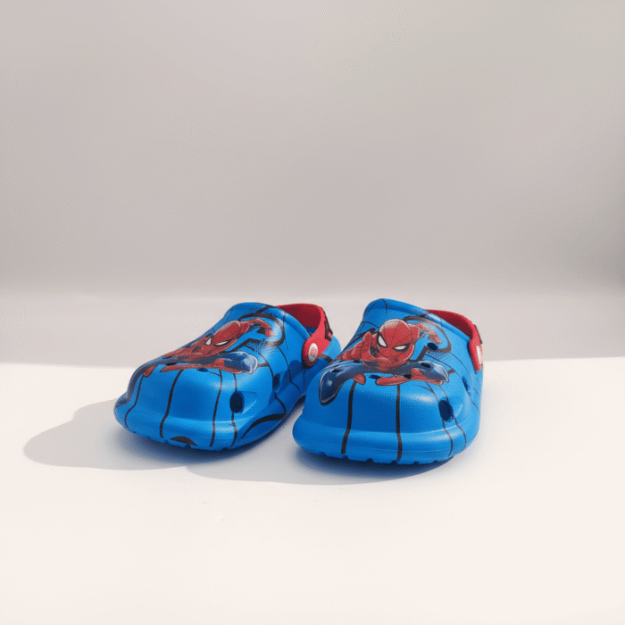 Bright blue kids clogs with Spiderman graphic and red accent interior, slip-on playful design, available at Mint LB Zahle Lebanon