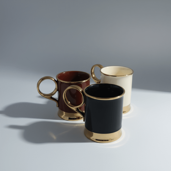 Modern black gold accent mug with polished gold handle, rim, and base, available at Mint LB Zahle Lebanon