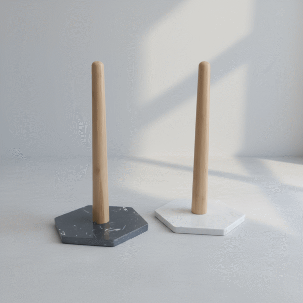 Modern black white paper towel holder with hexagonal weighted base and smooth upright rod, available at Mint LB Zahle Lebanon