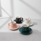 Elegant marble coffee cup set in pink, black, white, and teal with gold vein pattern, marble coffee cup set, available at Mint LB Zahle Lebanon