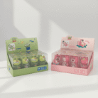 Green and pink Toy Story pencil sharpeners with Alien and Lotso character faces, fun school accessory, green pink Toy Story pencil sharpener, available at Mint LB Zahle Lebanon