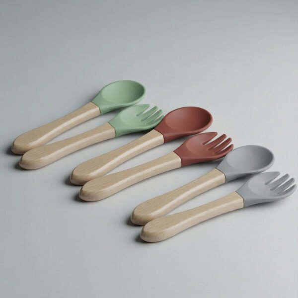 Modern baby feeding set gentle colors with sage green, terracotta, and soft grey soft-head utensils, smooth natural handles, available at Mint LB Zahle Lebanon